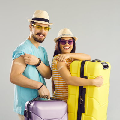 Couple show off their injection site after getting travel vaccine and medicine from travel clinic.